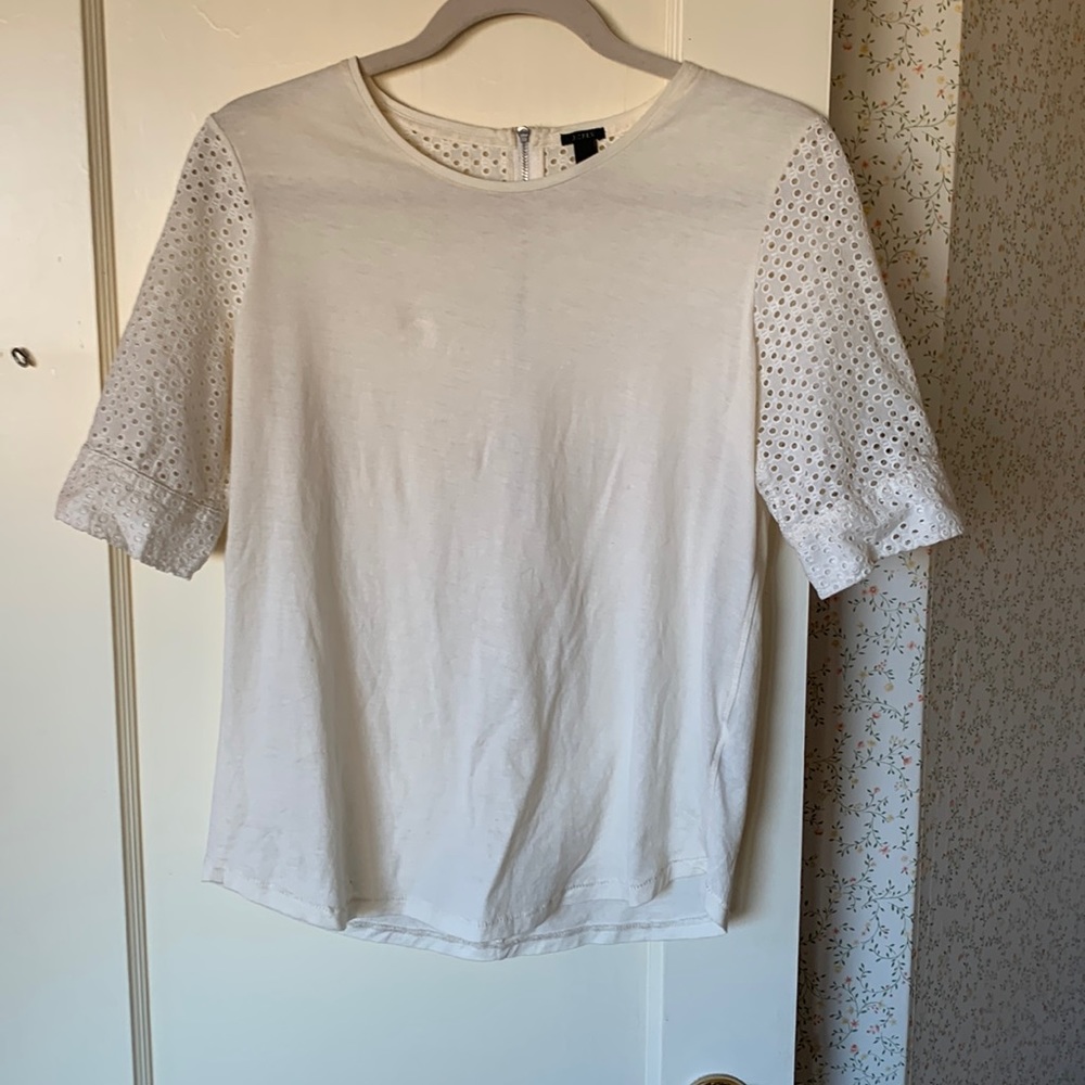 J.crew short sleeve. Size small. Cute sleeves and zipper up back. Off white.